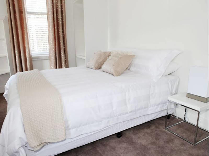 Albany Central Apartments Bagian luar foto