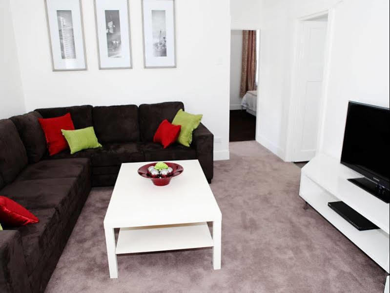 Albany Central Apartments Bagian luar foto