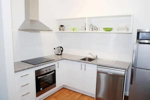 Albany Central Apartments Bagian luar foto